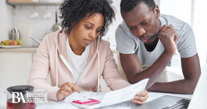 an adult couple putting together a budget for their allergy medication