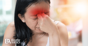 a woman suffering from sinus issues